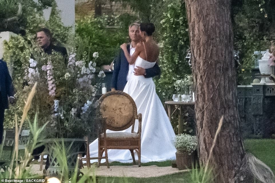 The happy couple could be seen holding each other tightly during their first dance